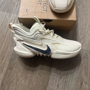 Nike Cosmic Unity 2 Cream Sneakers with Black Logo